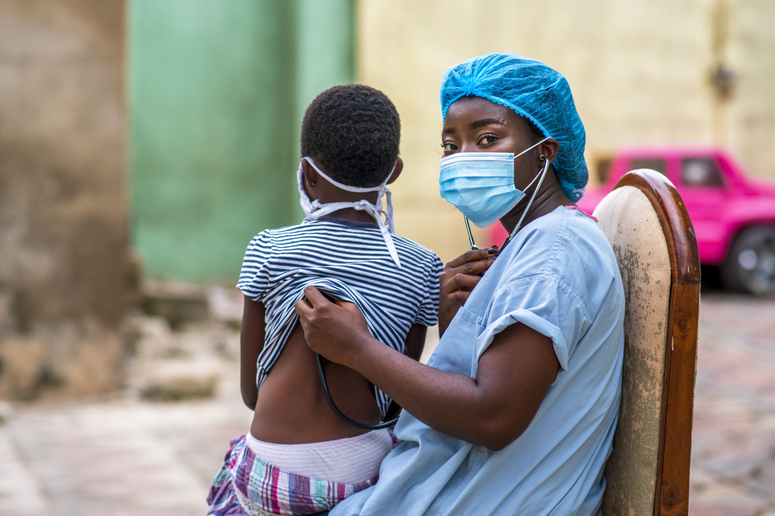 closeup shot of a boy getting a checkup by a doctor